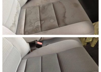 On the top, there is a stained driver's car seat. On the bottom, there is a clean driver's car seat.